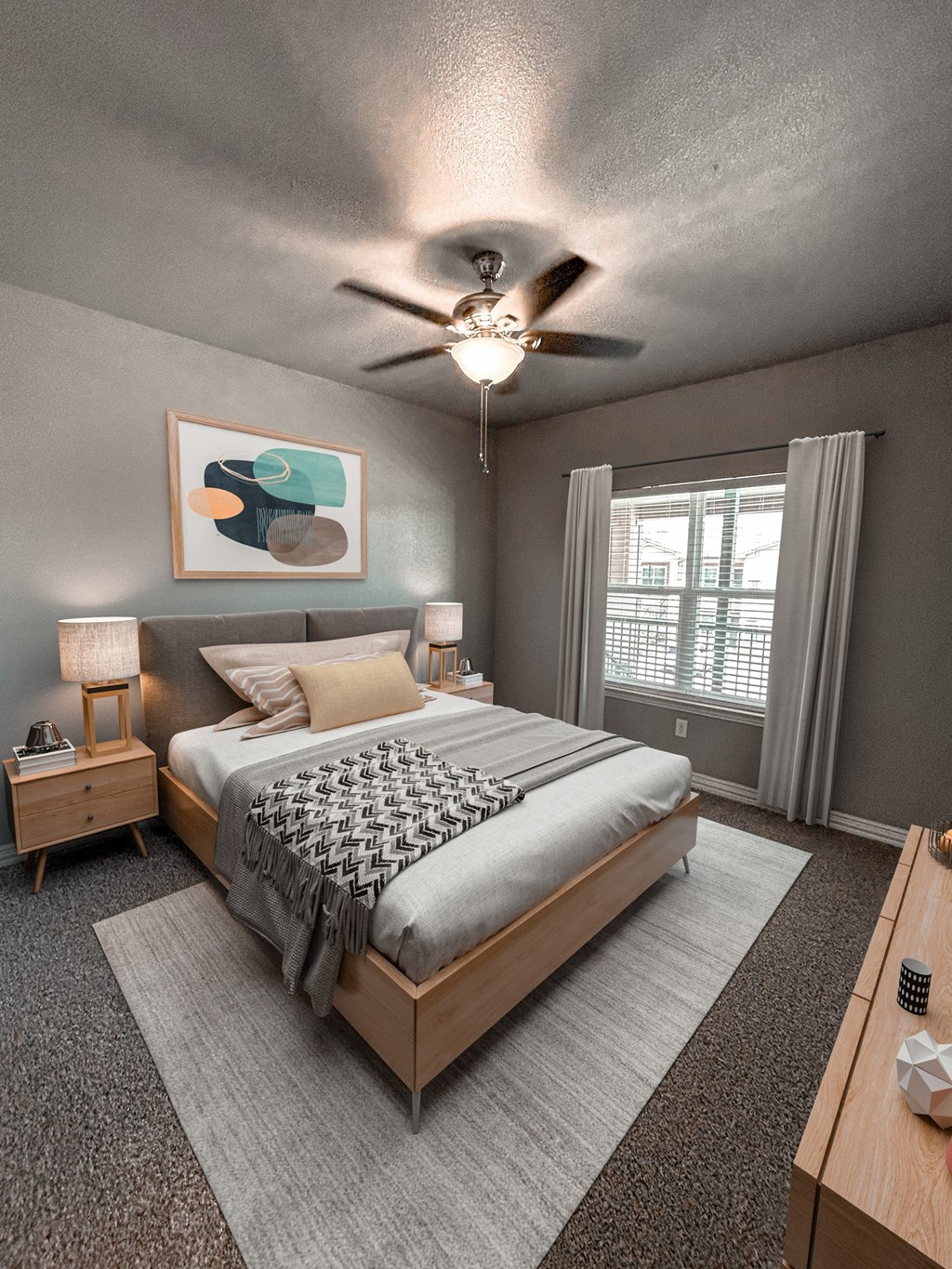 a bedroom with a bed and a ceiling fan