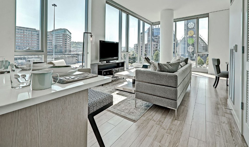 a living room with a couch and a television