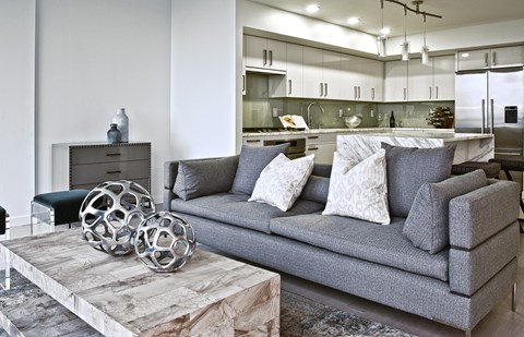 a living room with a couch and a coffee table