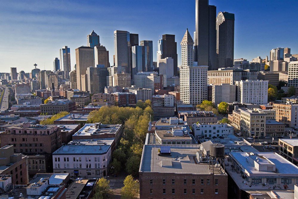 a view of the city with buildings and skyscrapers