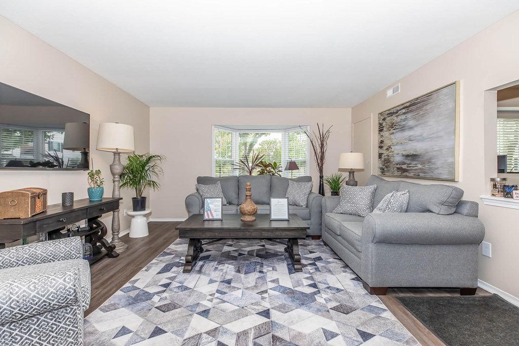a living room with a couch and a coffee table