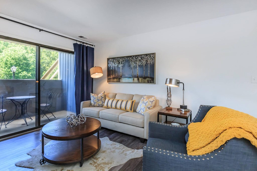 a living room with a couch and a table