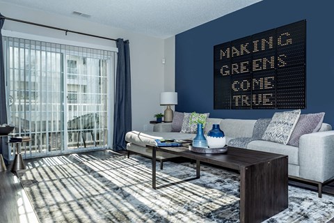 a living room with a couch and a table