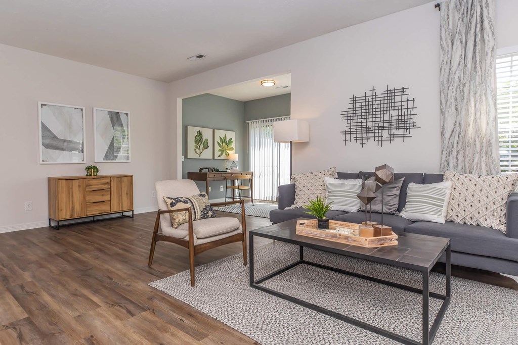 a living room with a couch and a table