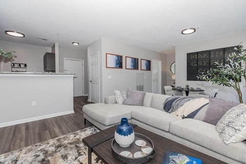 a living room with a couch and a table