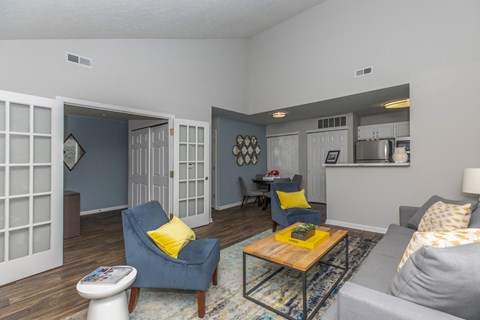 a living room with a couch and a table