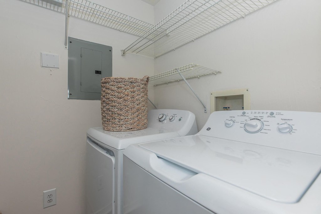 a washer and dryer in the laundry room of a home