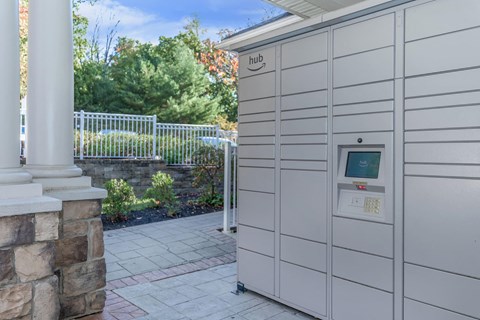 a garage with an automated door on the side of a house