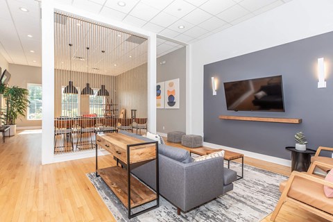 a living room with a couch and a table