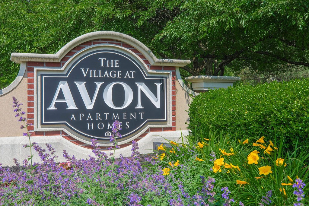 the village at avon apartment homes sign