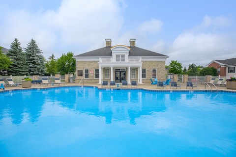 the swimming pool at the club at highlands apartments