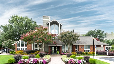 A house with a garden in front.