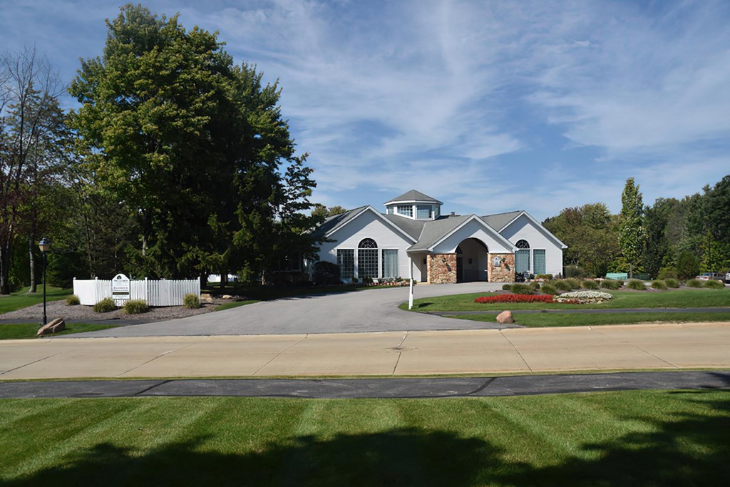 a house with a driveway in front of it