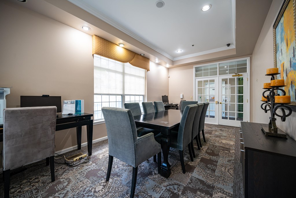 Conference room with wooden table and 6 chairs