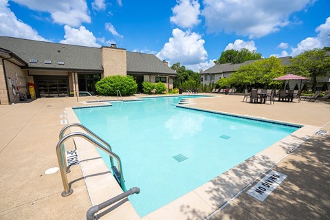 A swimming pool with a sign that says "NO DIVING".
