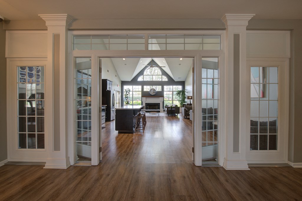 the dining room and living room of a renovated house