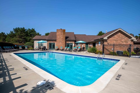Clear blue pool view at Pine Ridge Apartments, Rochester Hills, 48307