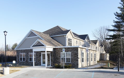 House Exterior with Parking Lot at Iroquois Village, New York, 12309