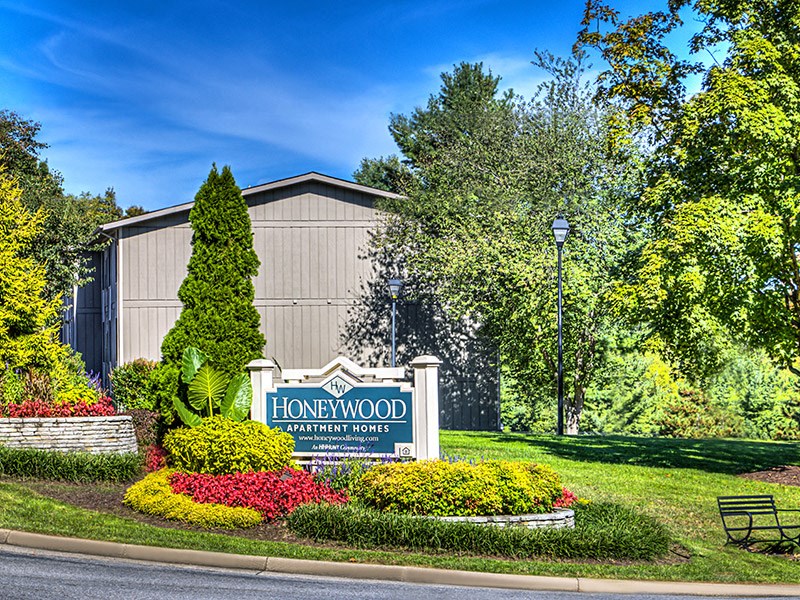 a home with a sign in front of a building