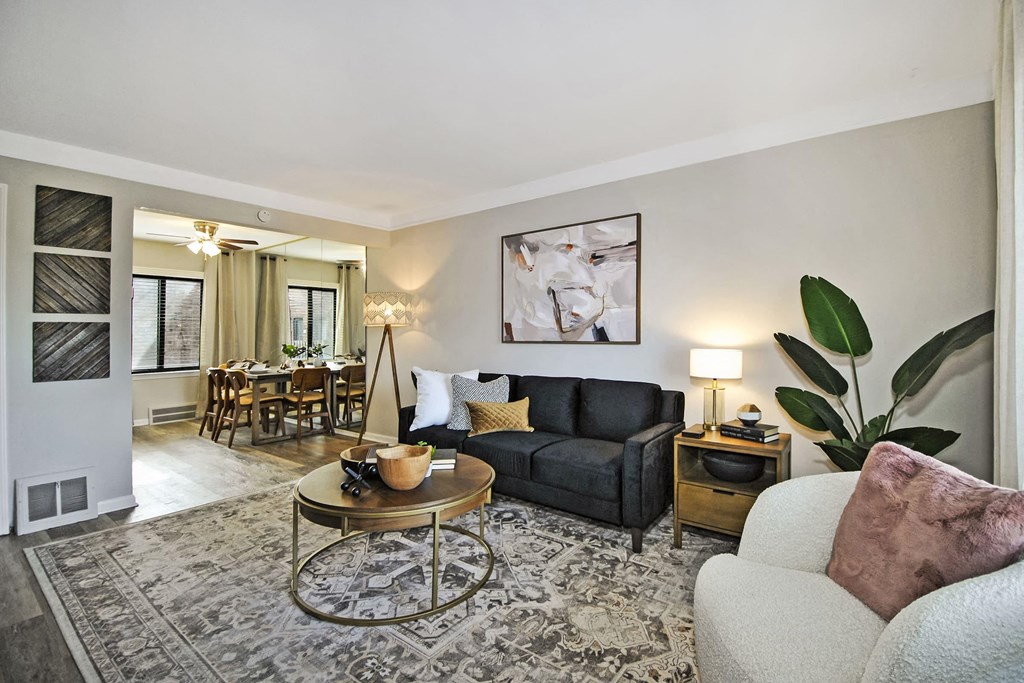 a living room with a couch and a table