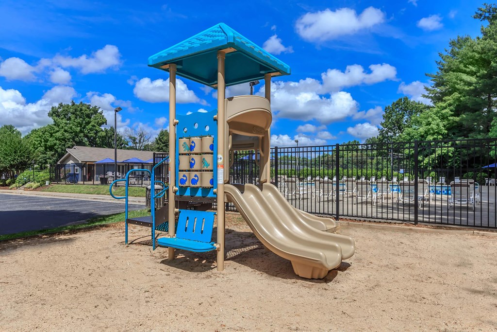 play structure with slides at the grove at surprise park