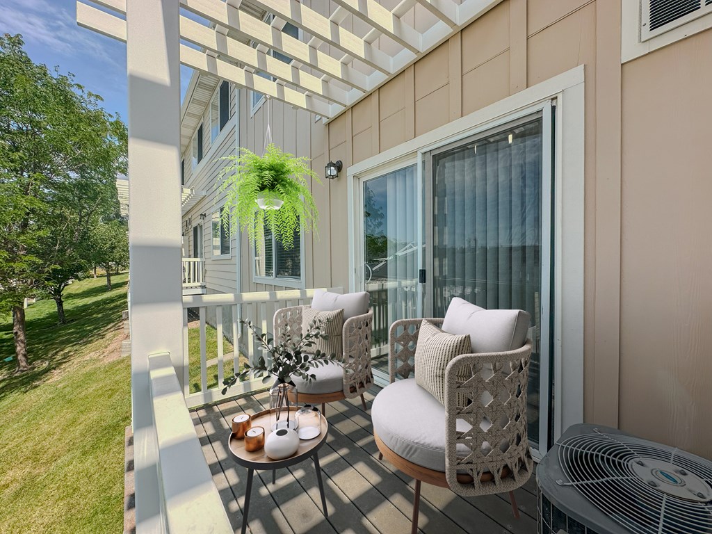 Liberty Hill Apartments, Draper, Utah, A patio with a table, chairs, and a potted plant.