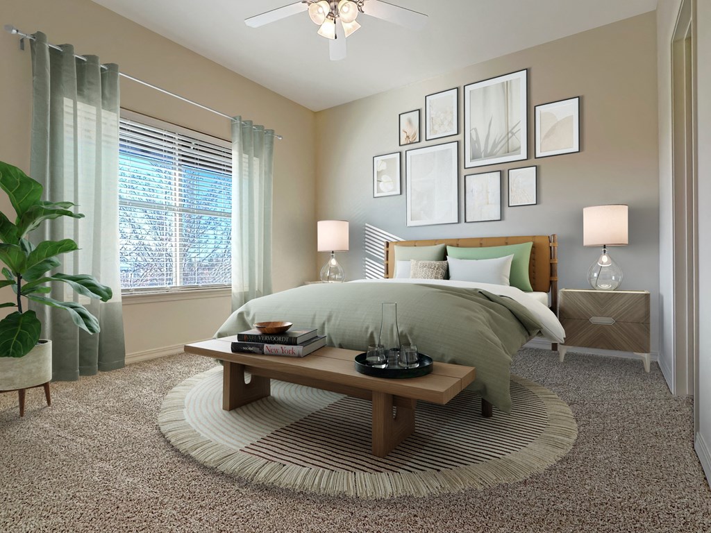 Liberty Bend Apartments, Sandy, Utah, Bedroom with bed, table and artwork on walls.
