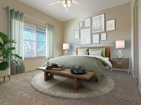 Liberty Bend Apartments, Sandy, Utah, Bedroom with bed, table and artwork on walls.