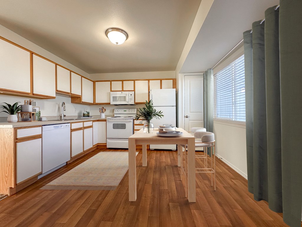 Liberty Hill Apartments, Draper, Utah, kitchen with wooden floors and white appliances.