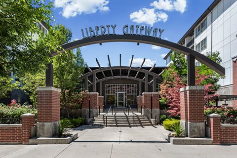 The entrance to the Liberty Gateway building is framed by red brick pillars.