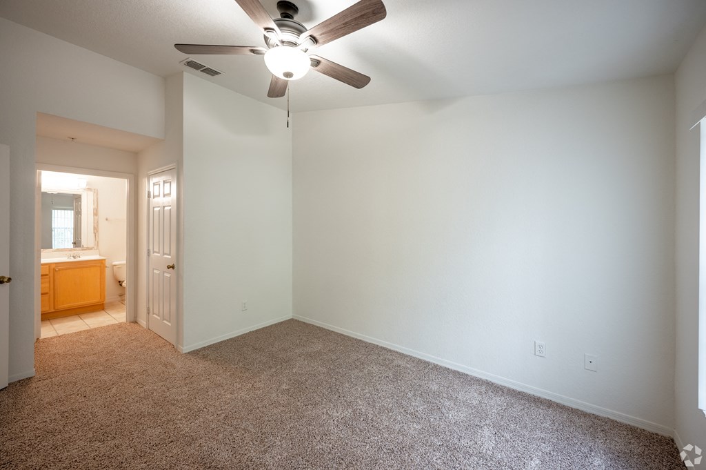 Large bedroom with ensuite and ceiling fan