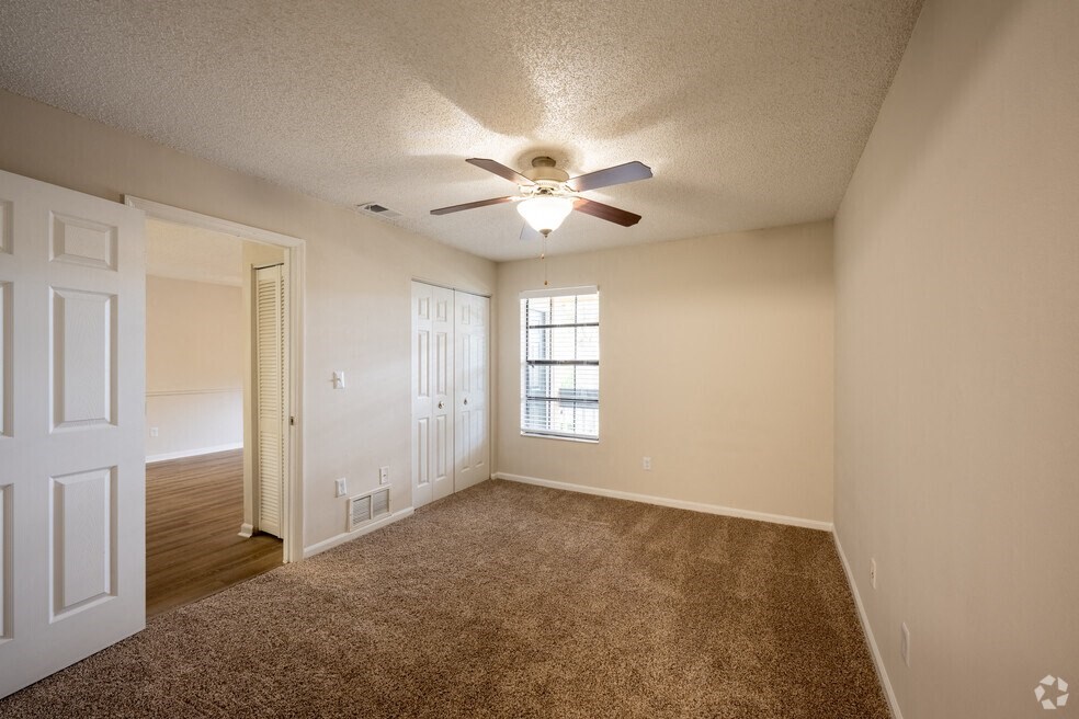 an empty living room with a ceiling fan at Lakeside Gardens, Florida, 32114