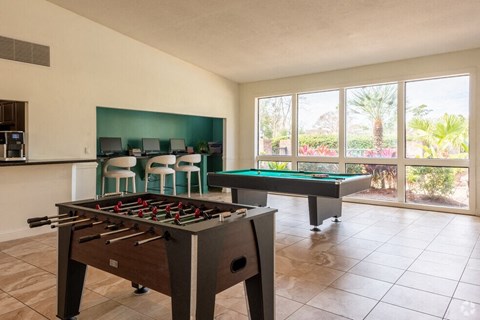 a game room with two pool tables and a bar at Lakeside Gardens, Daytona, 32114