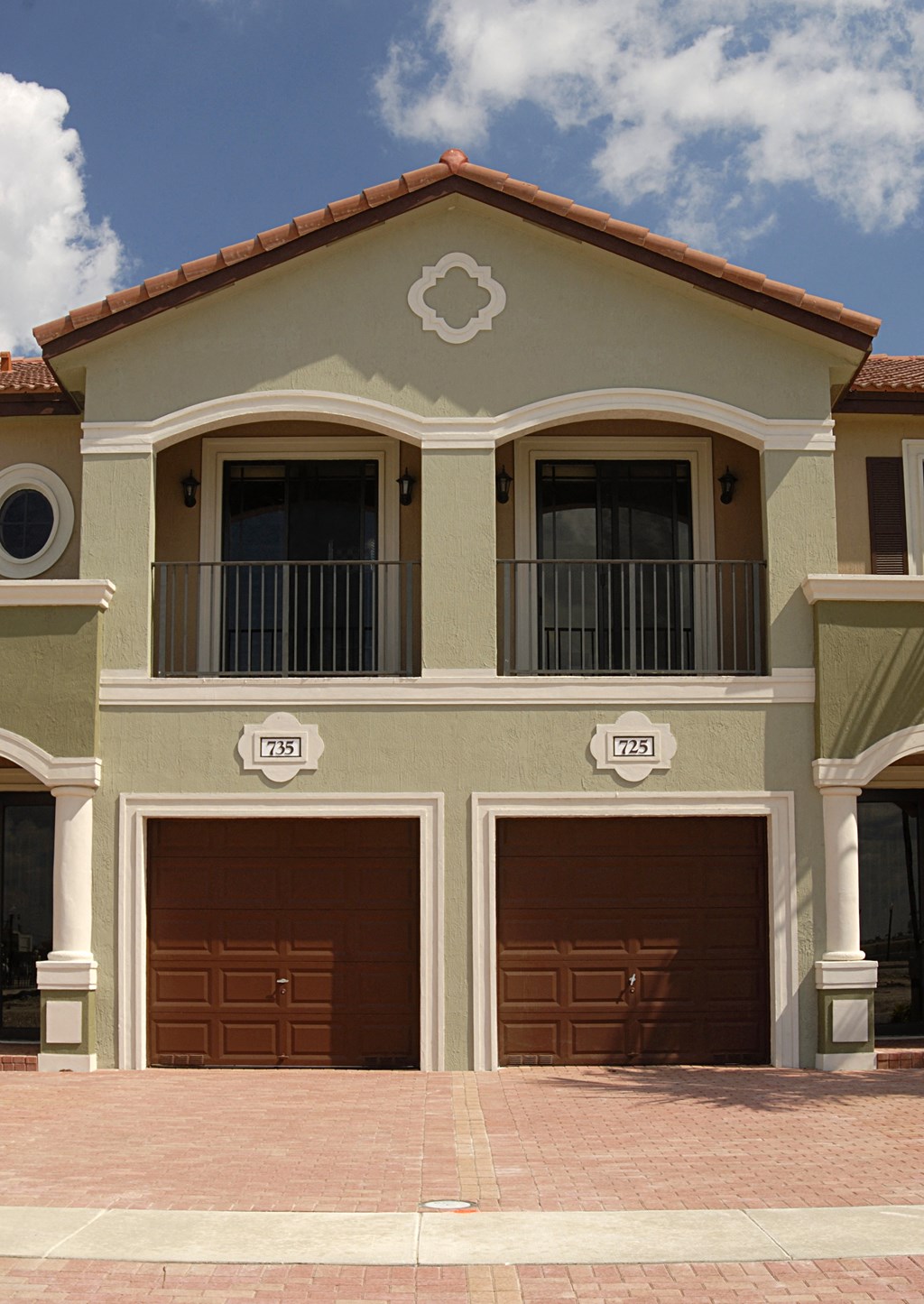 a house with three garage doors