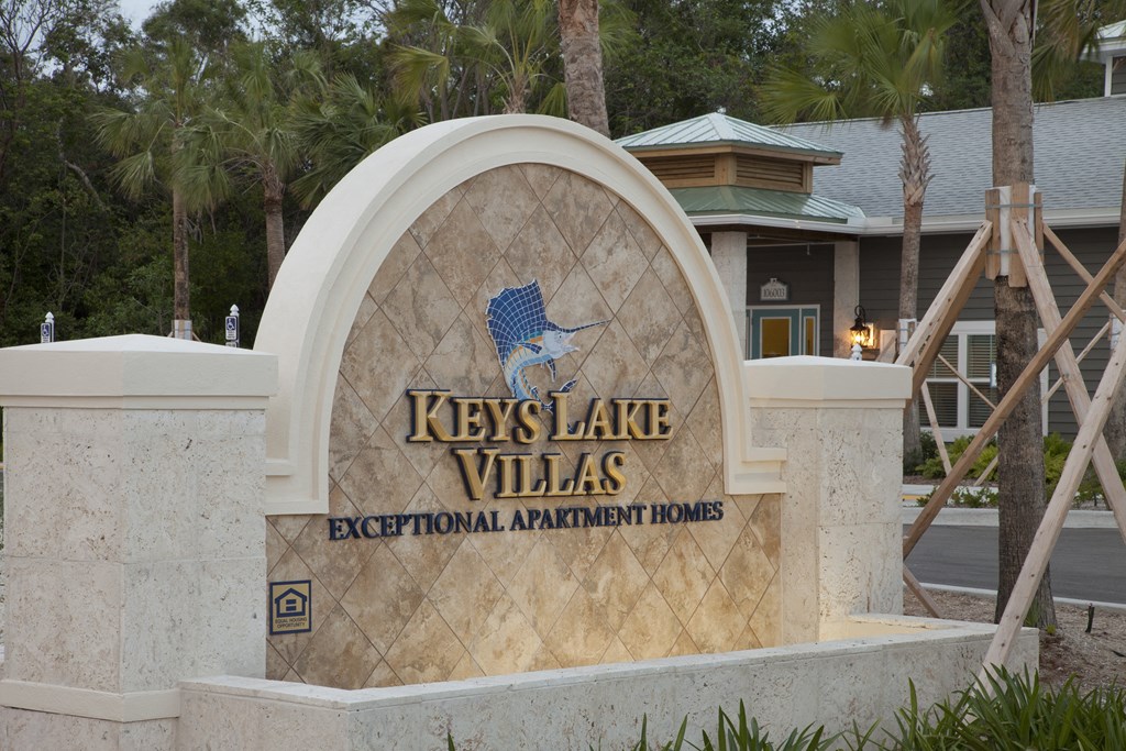 a sign for the keys lake villas executive apartment homes
