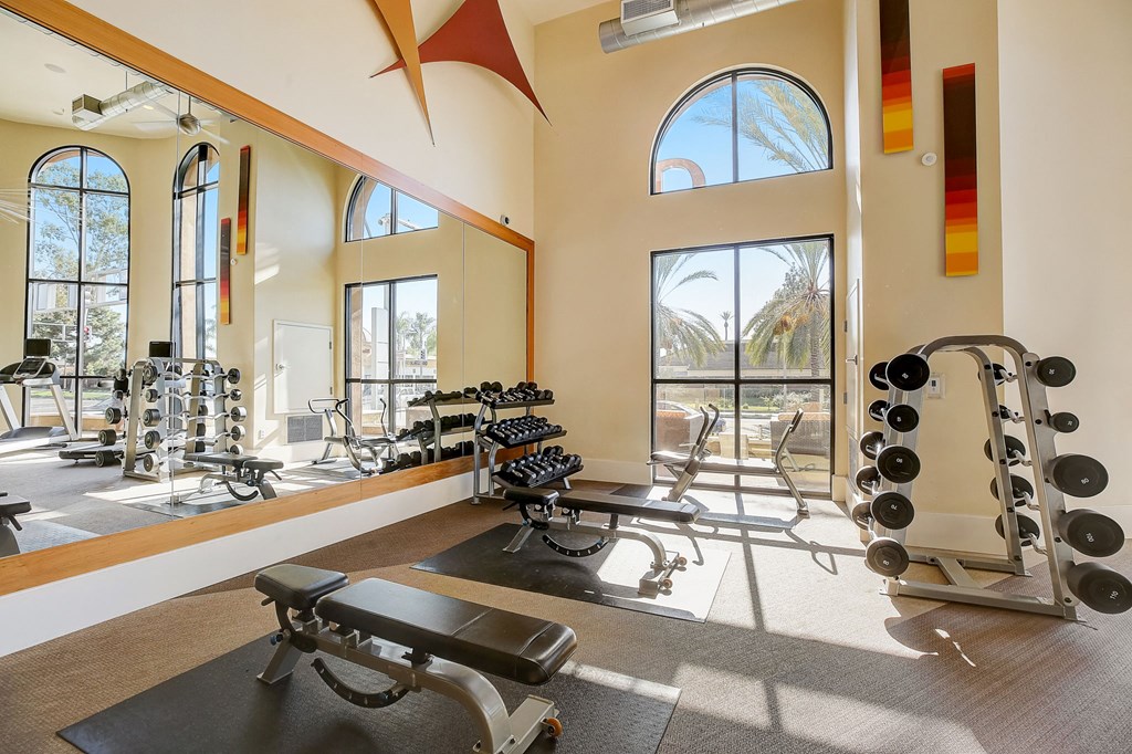 the preserve at ballantyne commons fitness center with exercise equipment and windows