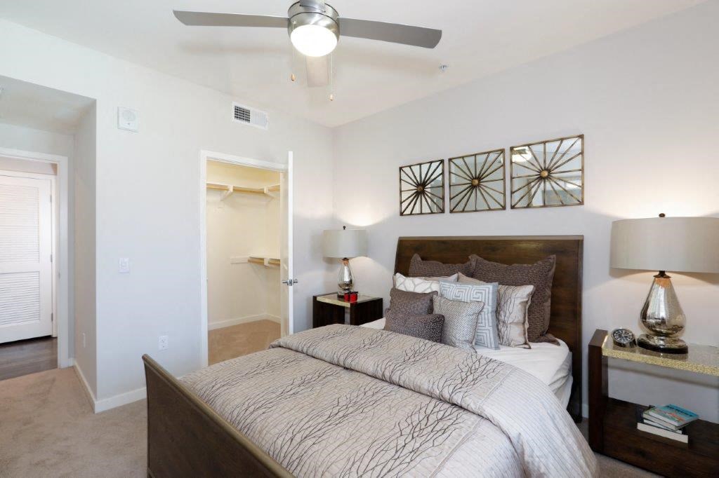 Plan B1: Bedroom a bedroom with a bed and a ceiling fan