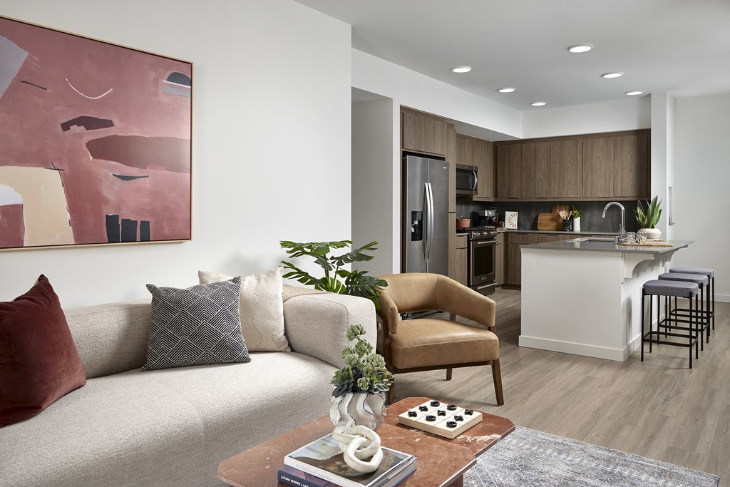 a living room and kitchen in a model apartment