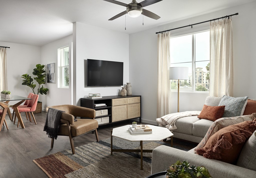 a living room with a couch and a tv