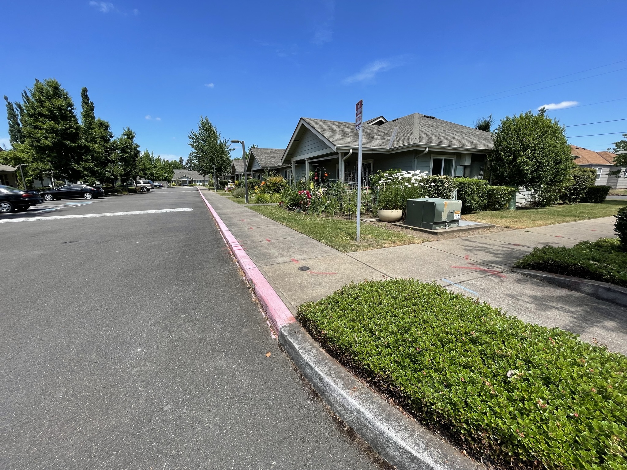 Exterior view showing sidewalks and covered porches