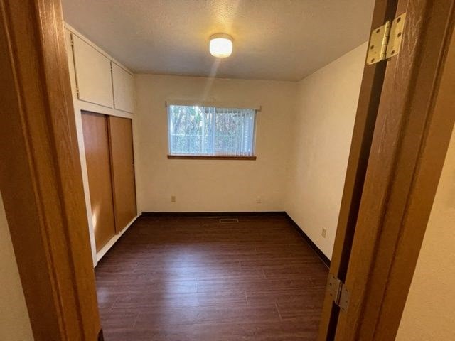 Bedroom 3, view of window and closet