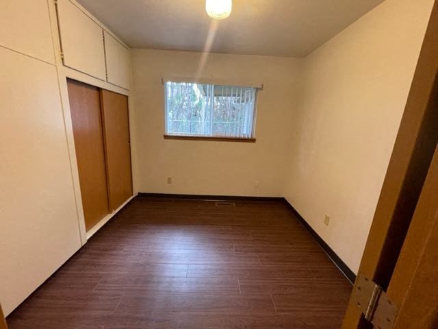 Bedroom 2, view of window and closet