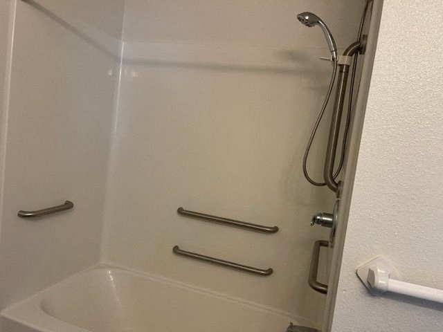 Tub shower combo with grab bars