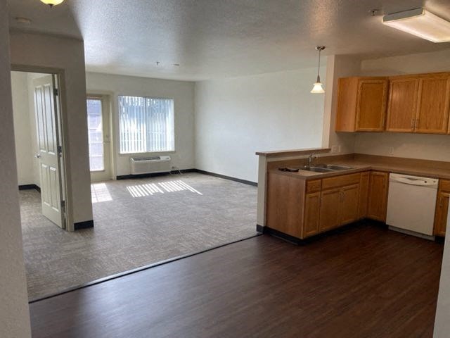 View of kitchen and open living room