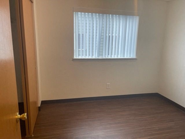 Bedroom 3, window and vertical blinds