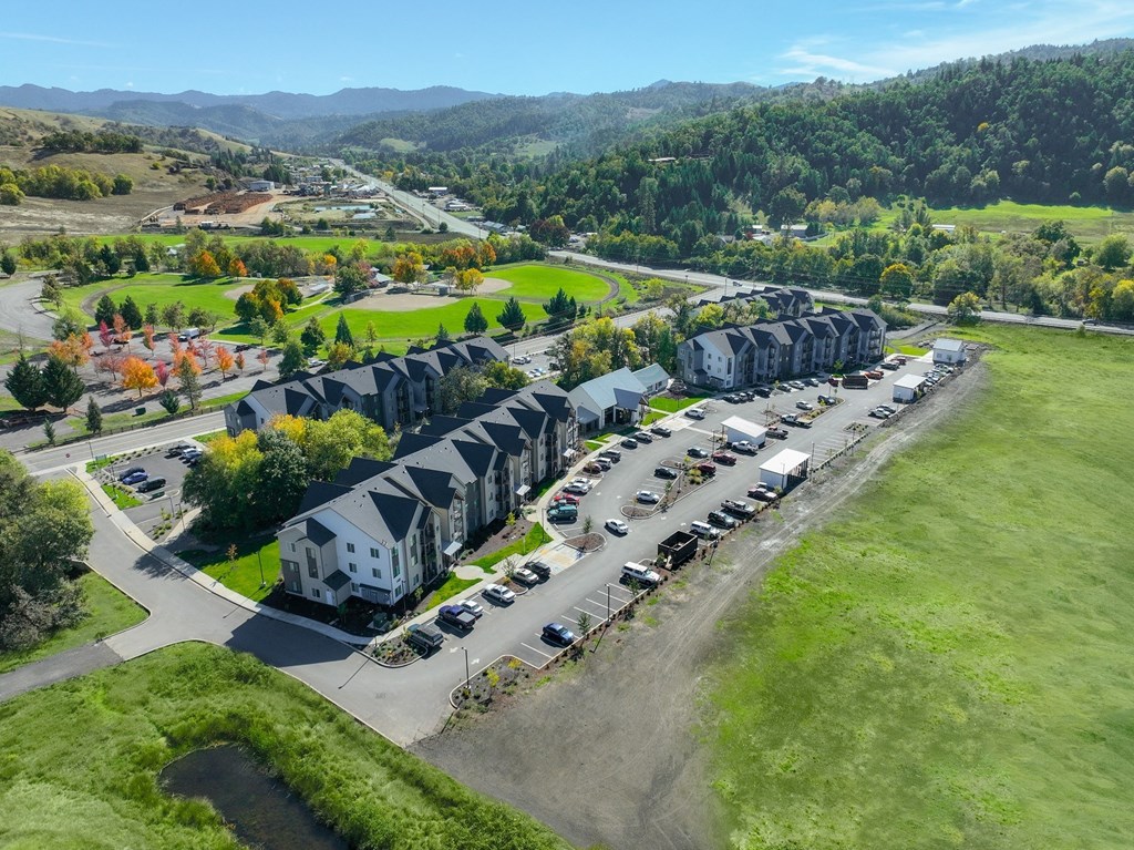 a aerial view of a neighbourhood of houses and a golf course