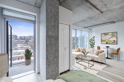A modern living room with a view of the city.