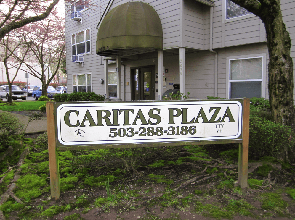 a sign in front of a house that reads cardiac plaza