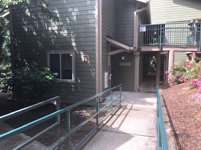 a house with a porch and a walkway