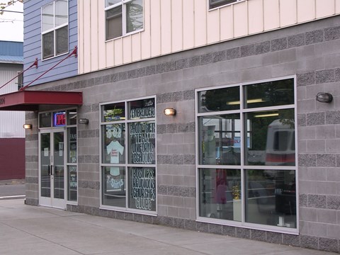 A building with a red awning and a sign that says CPE.